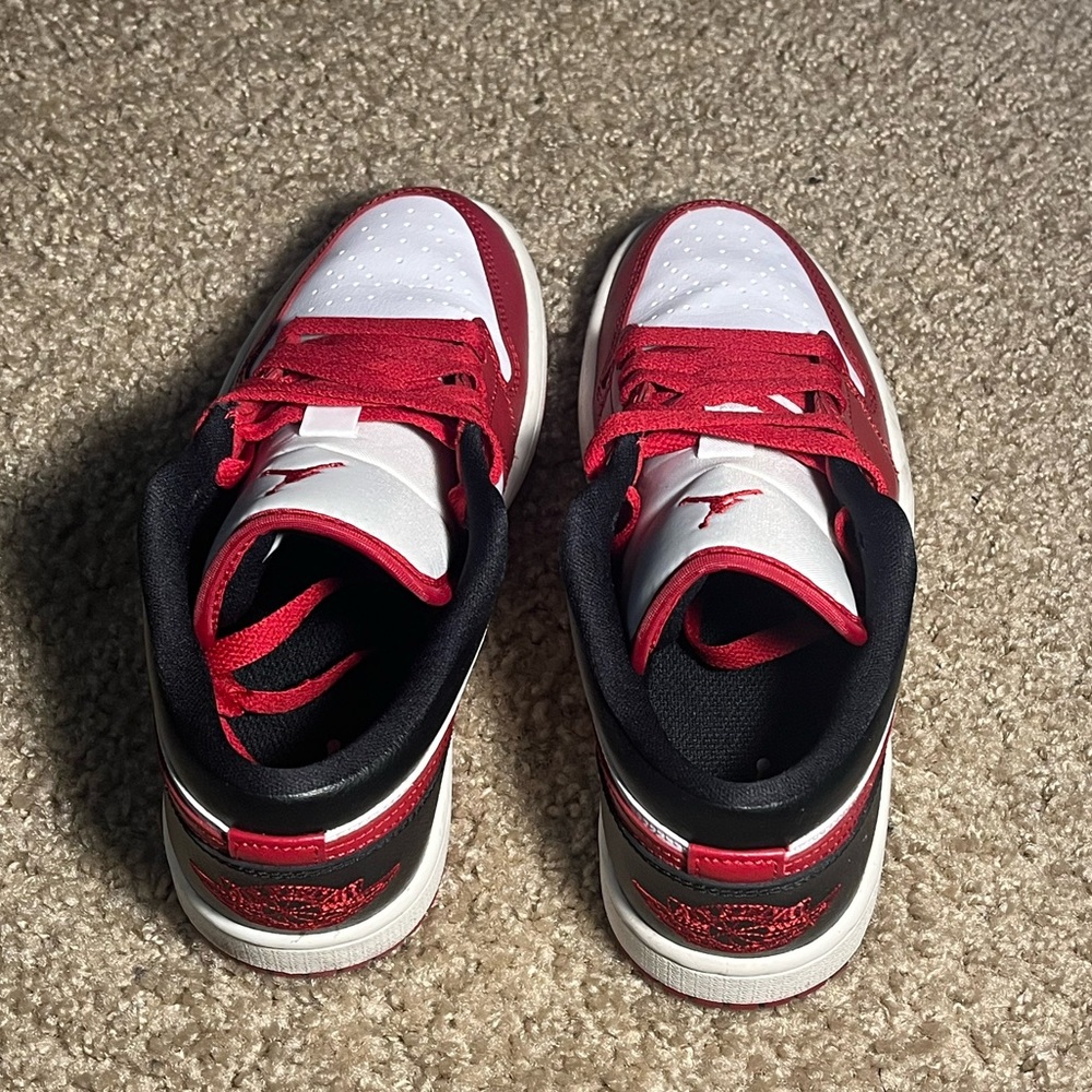 Woman’s Air Jordan 1 Low. Black, White, & Red. Size 6. Worn twice